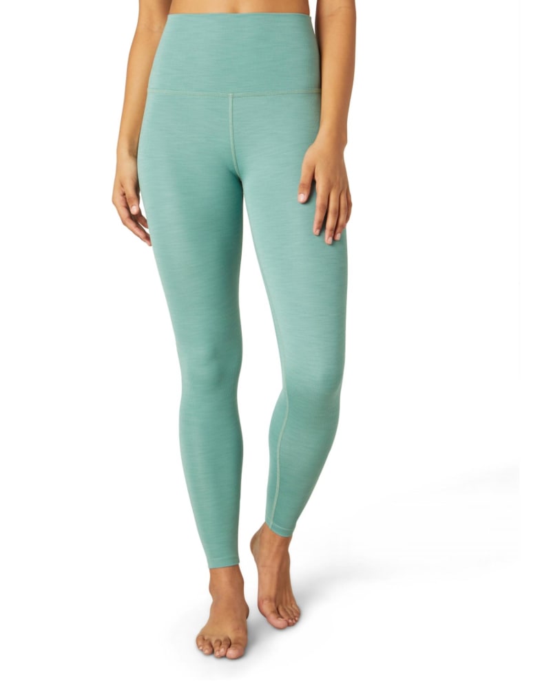 Front of a model wearing a size Large Spacedye High Waist Legging in Mermaid Green Heather in Mermaid Green Heather by Beyond Yoga. | dia_product_style_image_id:345499